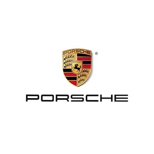 The Porsche logo, a luxury German car brand. A gold crest with company name across the top and a horse in the center.